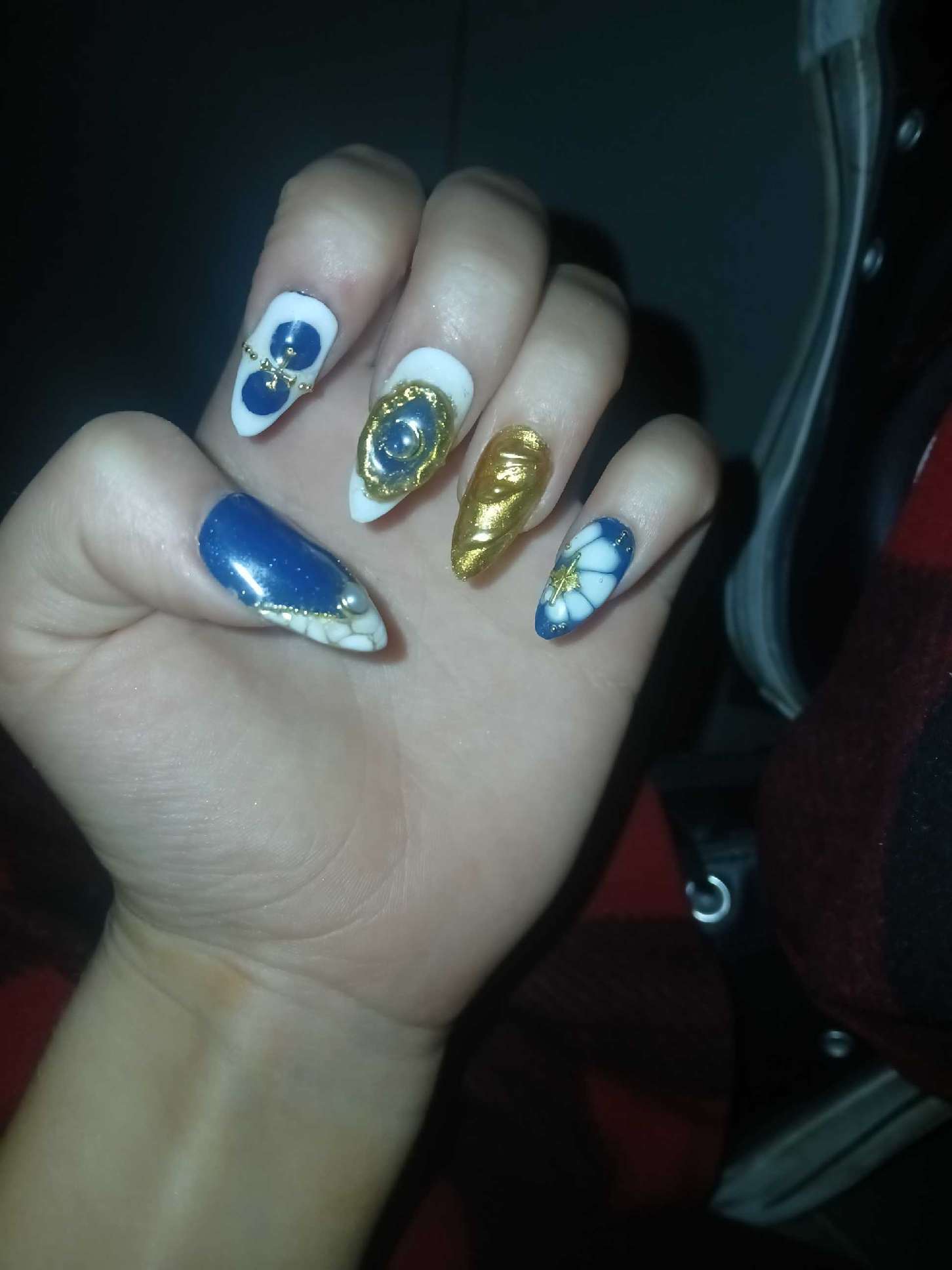 Blue, white, and gold nail set