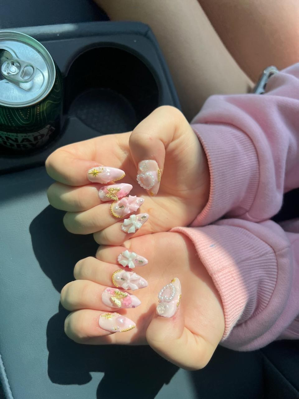 Close up of a pink bow nail set